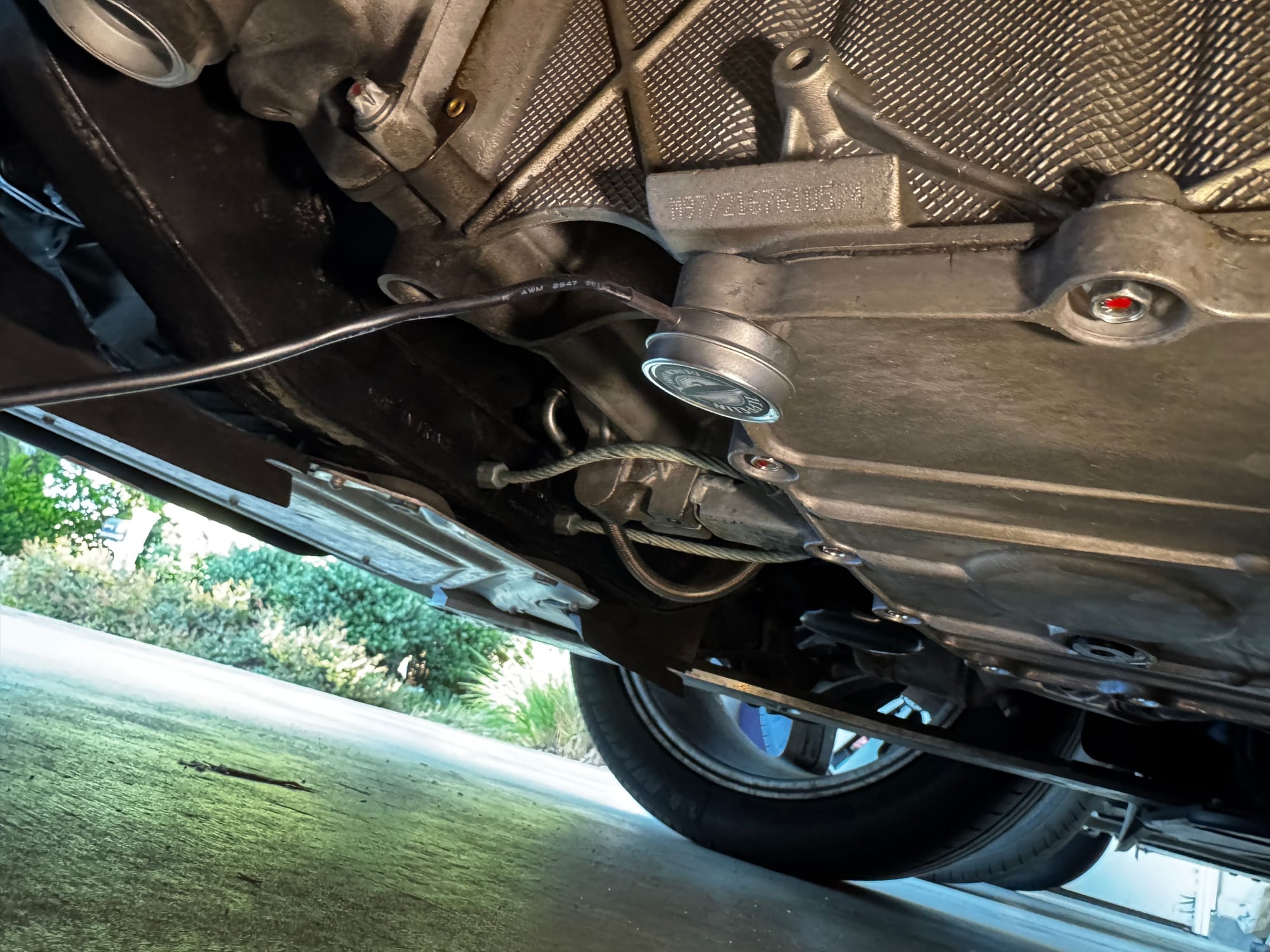 Cortado contact microphone magnet-mounted to the oil sump on the bottom of a Porsche engine