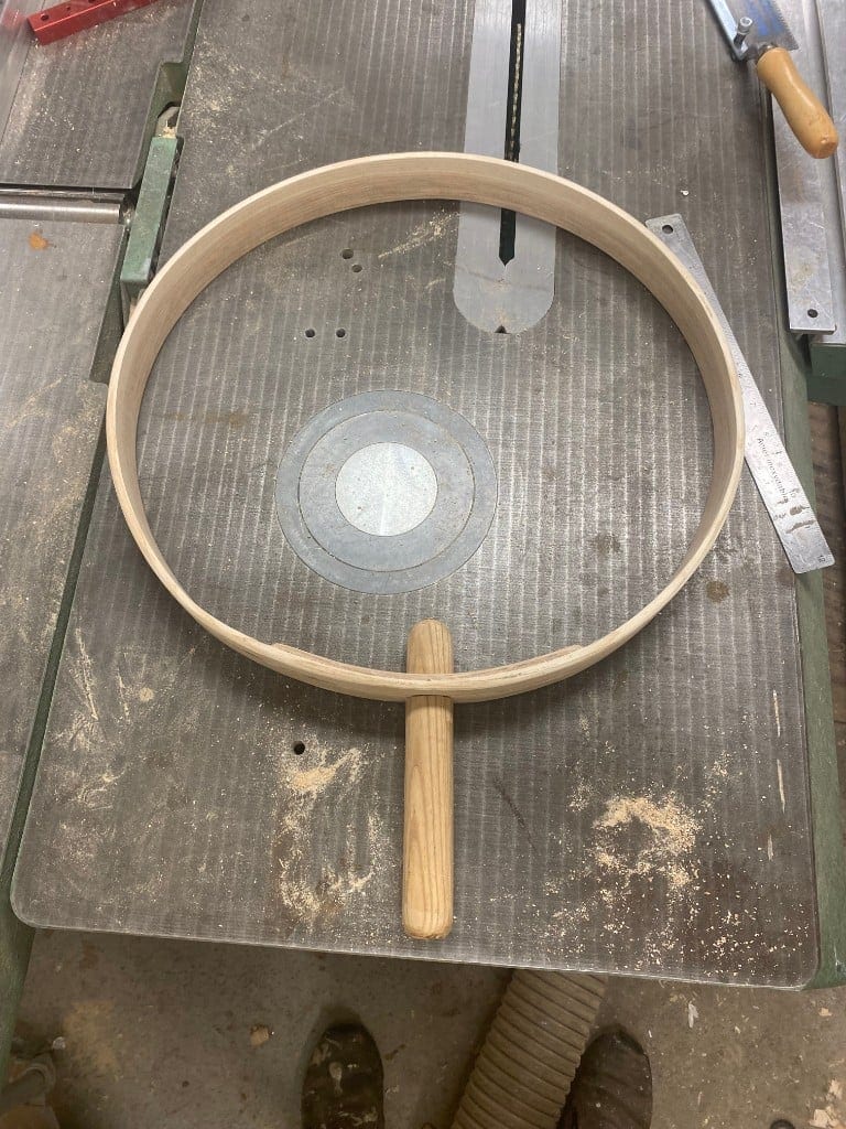 The completed steam-bent ash frame with its integrated handle